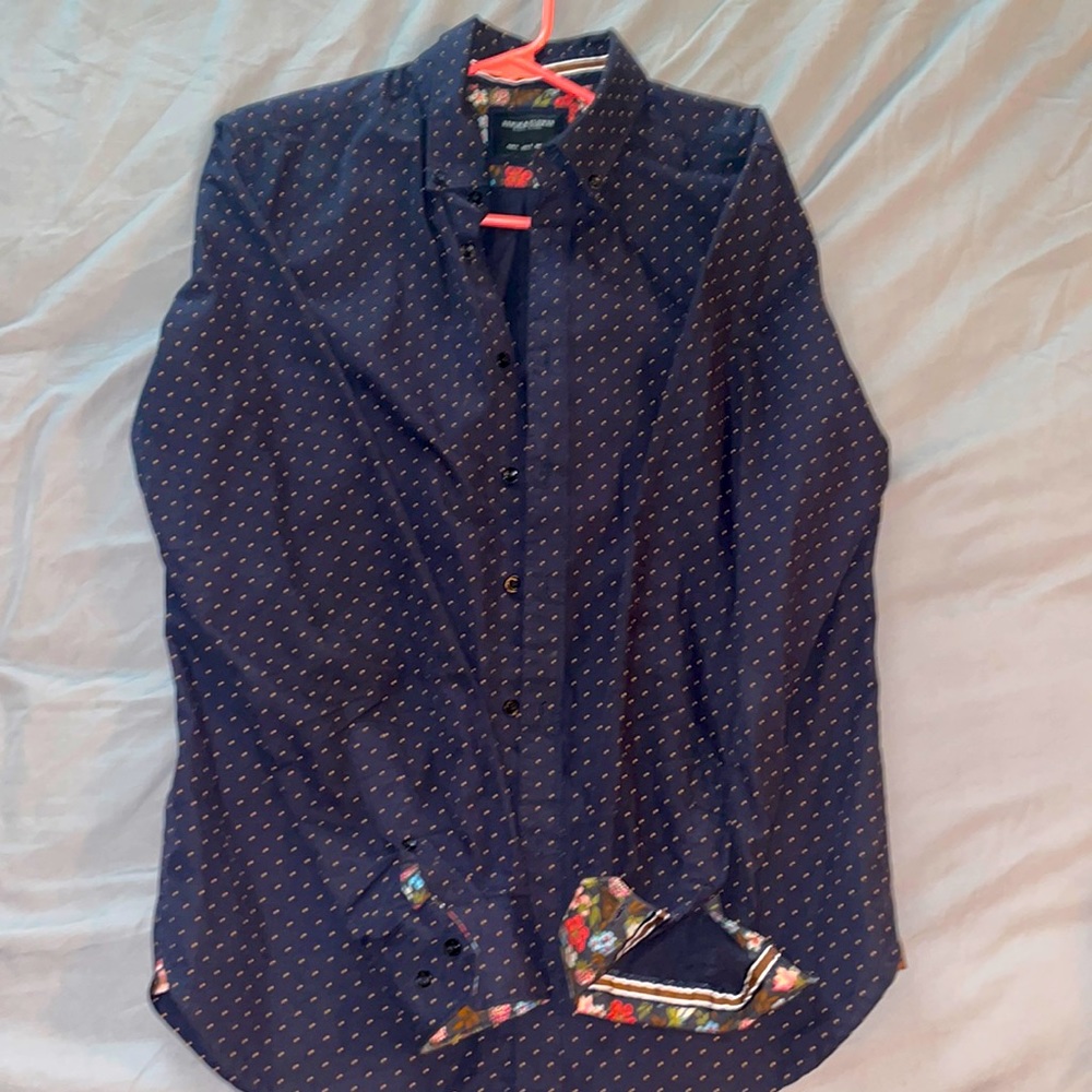 Navy blue button down long sleeve shirt with brown polka dots and floral cuff